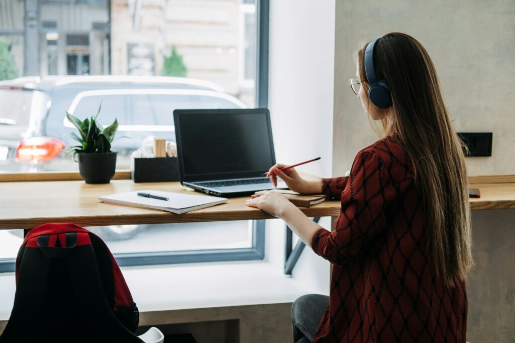 Part Time Business, Part-time job or side hustles concept. Young confident woman student in headset